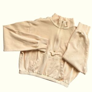 PacSun butter yellow 3/4 zip crop sweatshirt.